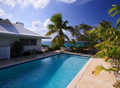Heron Hill rests majestically atop a 60' ocean bluff on Eleuthera Island. It overlooks Poponi Beach (right) which is absolutely magnificent.